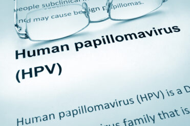 What types of HPV cause genital warts?